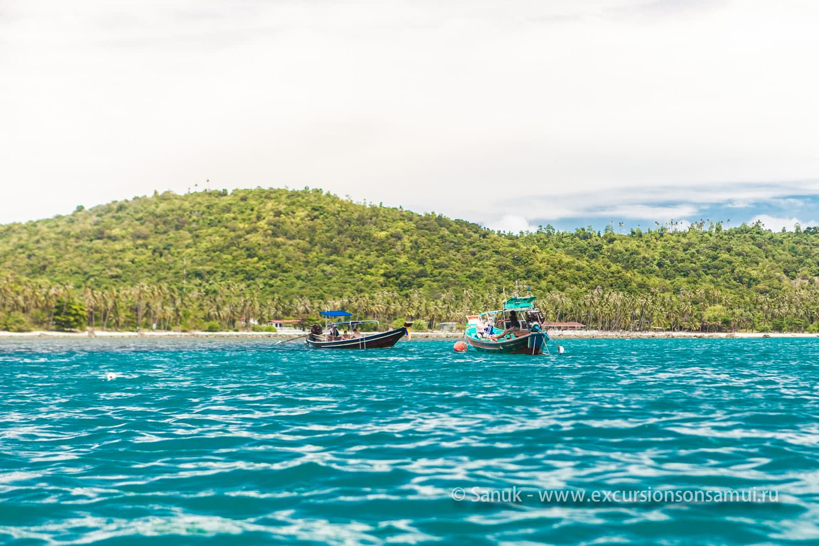 Snorkeling and fishing in the waters of Koh Tan, Koh Samui, Thailand